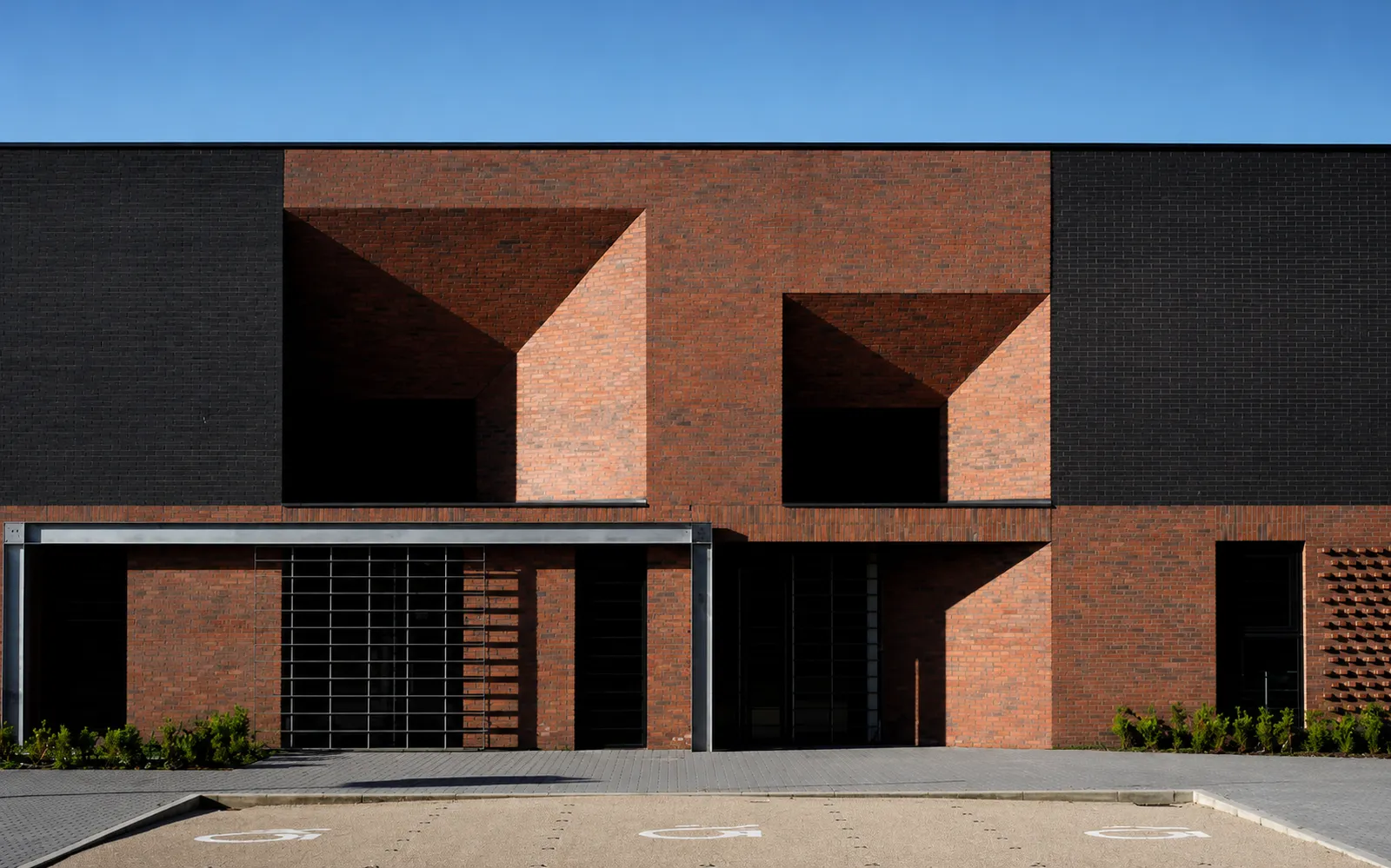 The Foundry, a dark brick commercial building in Manchester