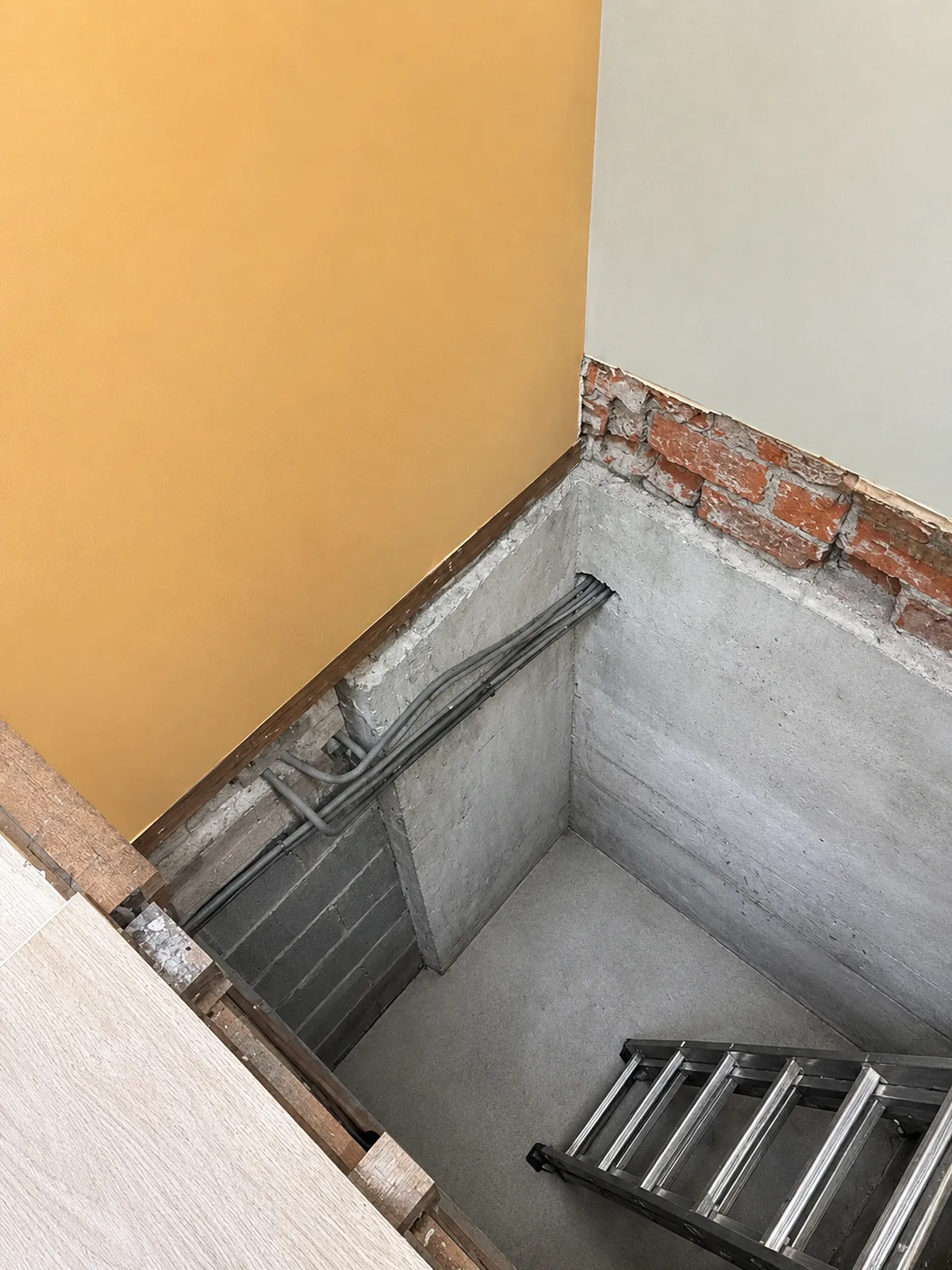 The original deep lift pit uncovered during the strip-out