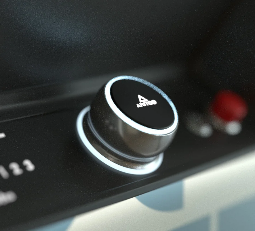 Close up of the Aritco SmartControl dial, a stainless steel control ringed with white light, beside a red stop button