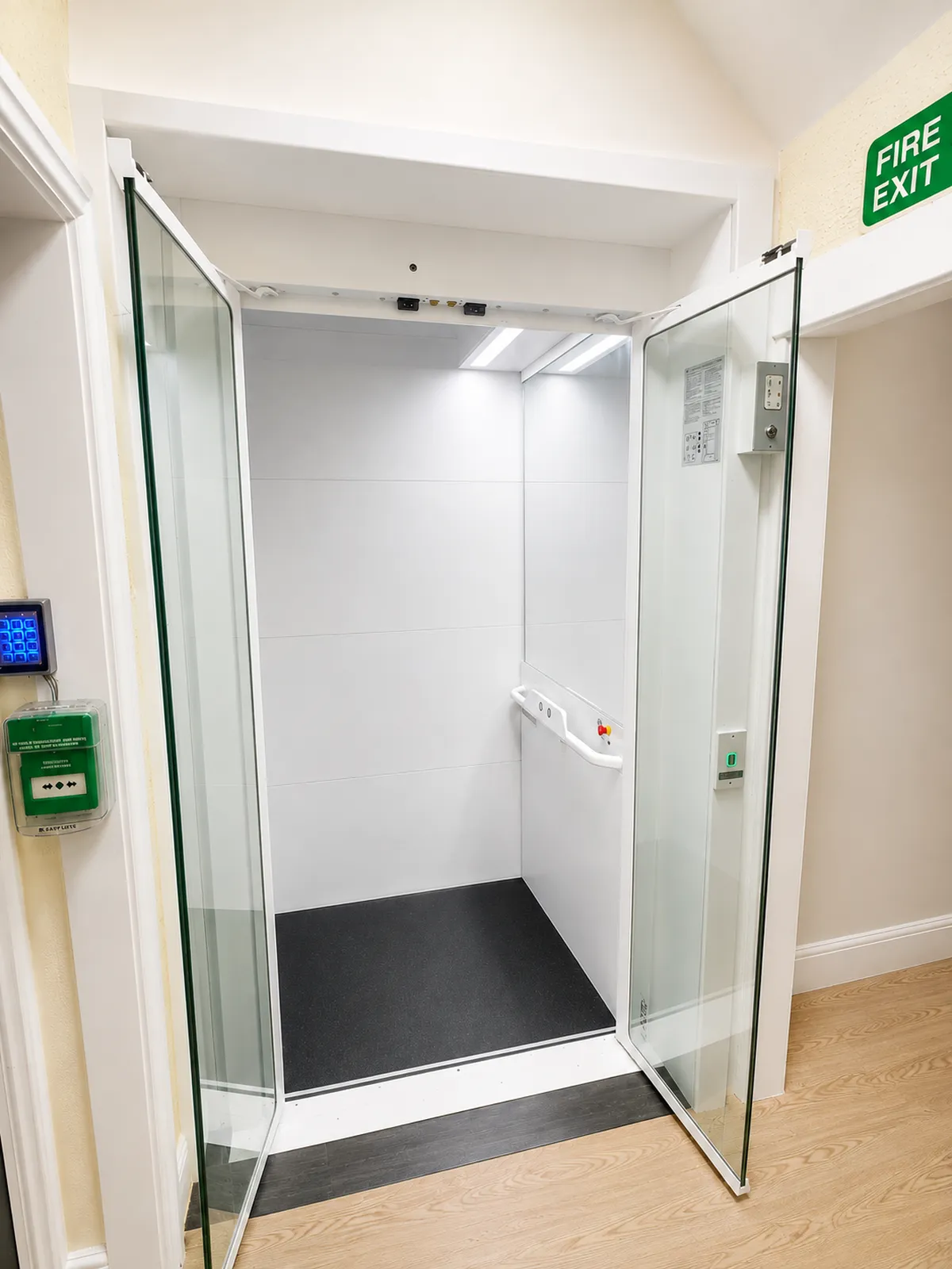 Finished Aritco Compact home lift with glass doors open